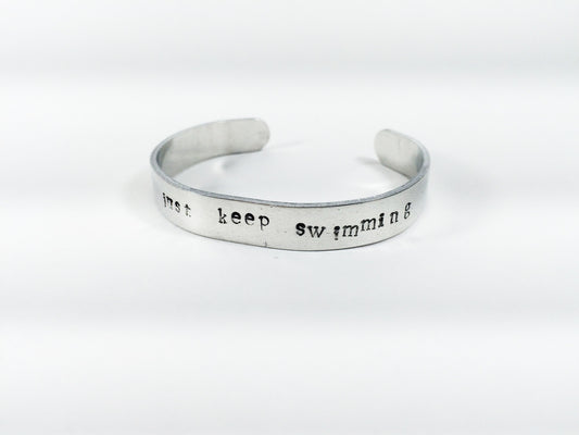 "Just Keep Swimming"  handmade aluminum bracelet